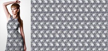 05017v Materiał ze wzorem szare i białe przecinające się linie, układające się w trójkąty